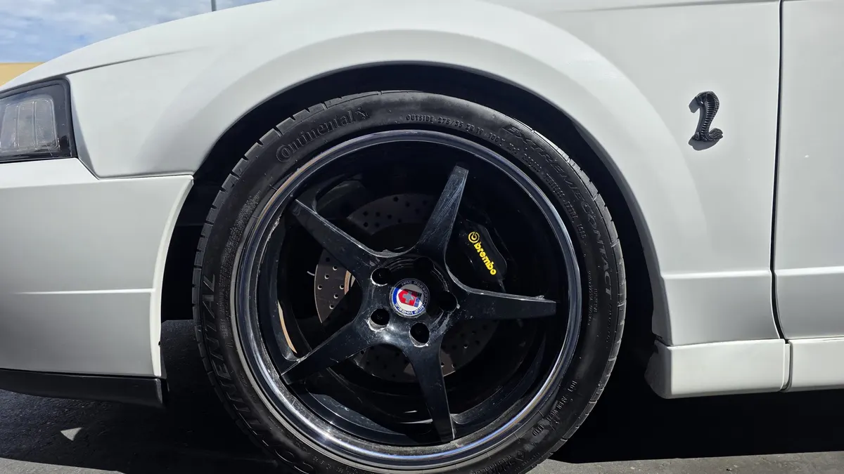 Performance wheel and tire on a customer car at Smog Mart