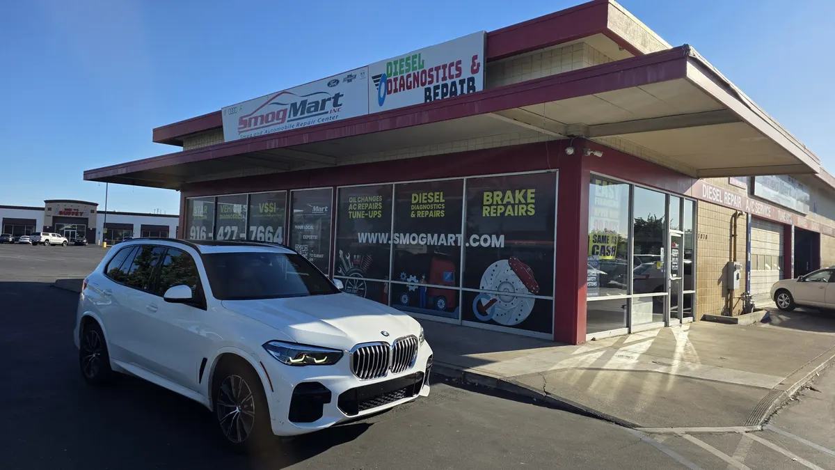 Customer SUV parked at Smog Mart in Sacramento